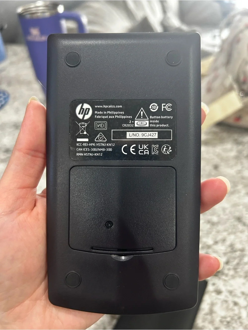 HP Financial Calculator in Black with Teal and Coral Accents